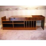 A late 20th century Scandinavian Rosewood veneered sideboard of rectangular form with