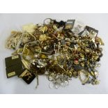 Quantity of costume jewellery to include necklaces, earrings, brooches, rings and watches