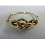 9ct gold knot link bracelet, approx 16.8g