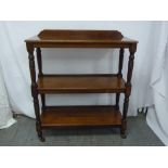 Victorian mahogany three tier buffet on original castors