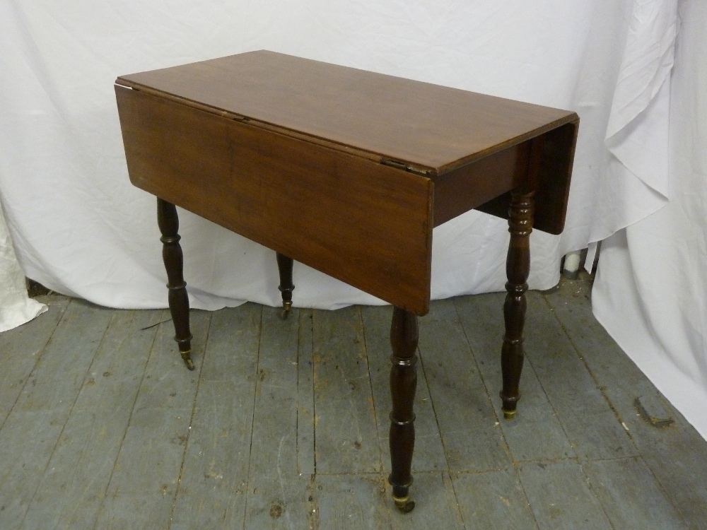 Mahogany Pembroke table on four turned legs with single drawer