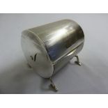 Samson & Morden engine turned revolving silver box with ivory circular inserts on four feet,