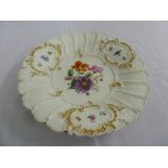 A Meissen gilded and hand painted cabinet plate, marks to the base