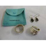 Tiffany silver mesh ring, another ring and a pair of silver and onyx earrings