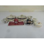 A quantity of porcelain to include pot lids and dishes, an inkwell and stand (8)