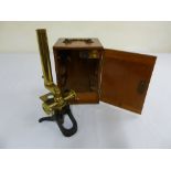 Heath brass microscope in fitted mahogany case with accompanying lenses