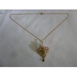 15ct gold seed pearl and tourmaline pendant on a 15ct gold chain, approx weight 10.5g
