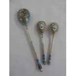 Three Russian silver and enamel teaspoons