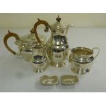 A silver four piece teaset of baluster form, Sheffield 1972 and a pair of silver salts