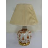 Oriental table lamp of globular form, to include a silk shade