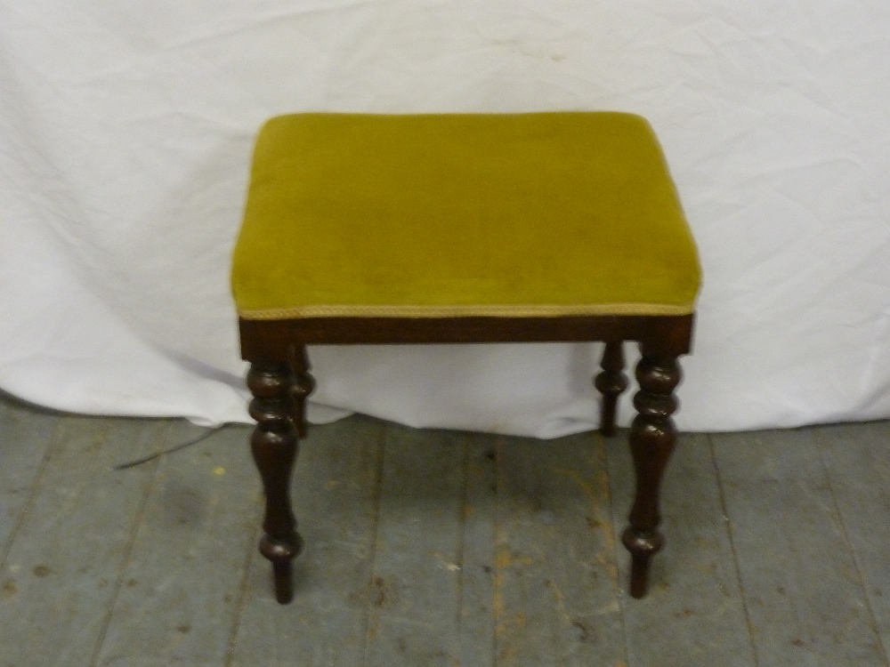 Victorian upholstered piano stool on four turned legs