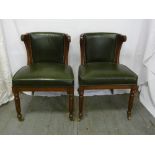 Pair of mahogany and green leather occasional chairs on fluted cylindrical legs