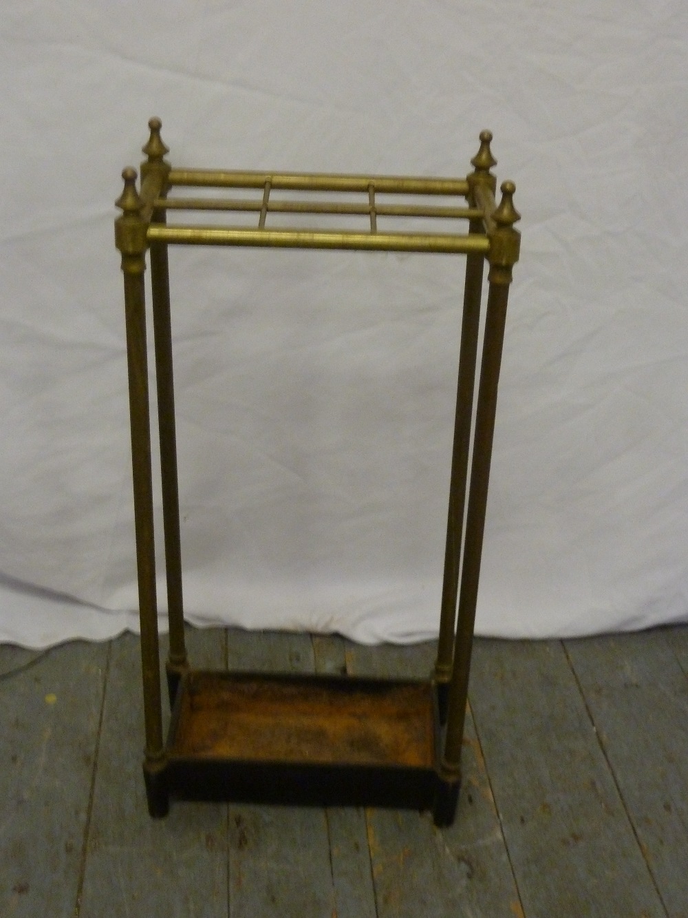 Brass umbrella stand of rectangular form