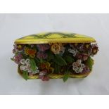 A Sevres style porcelain box and a quantity of beaded flowers