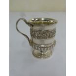 George III silver mug with vine chased band above a gadrooned border with cast snake handle on