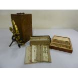 J. Swift & Co brass microscope in fitted case, approx 100 prepared slides (Flatters & Garnet) and