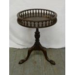 Victorian mahogany galleried wine table on tripod base with hoof feet