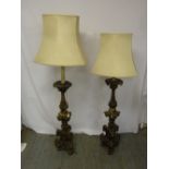 A pair of 17th century style candlesticks converted to floor lamps  A/F