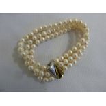 Three row pearl bracelet with 14ct gold clasp