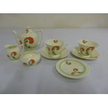 Royal Doulton tea for two circa 1920, to include teapot, milk jug, sugar bowl, cups, saucers and a