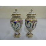 Pair of Dresden covered vases decorated with flowers and leaves, marks to the base