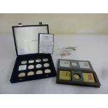 Cased set of twelve silver Concorde coins, a model of a Concorde on rectangular plinth with inset £5