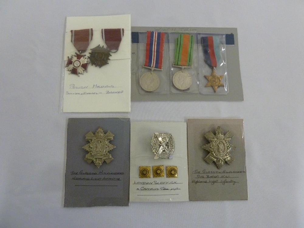 A quantity of Military medals and badges to include WWII medals, Polish medals, Glasgow