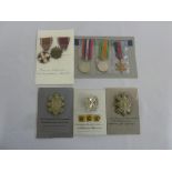 A quantity of Military medals and badges to include WWII medals, Polish medals, Glasgow