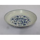 Chinese Ming style unglazed blue and white bowl decorated with dragons, six character marks to base