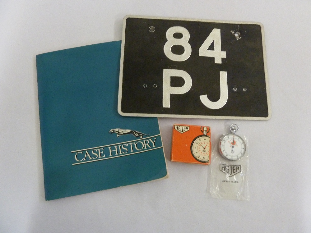 Heuer stopwatch in original fitted box and a 1960s Jaguar number plate with provenance