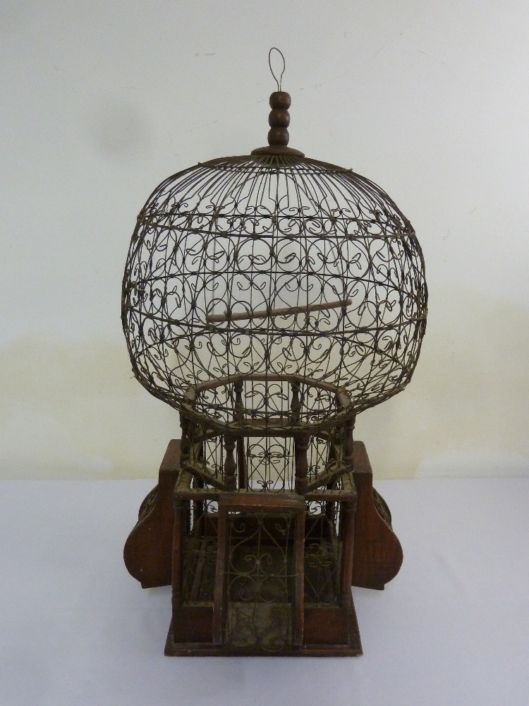 Victorian style metal and wood bird cage of oriental form