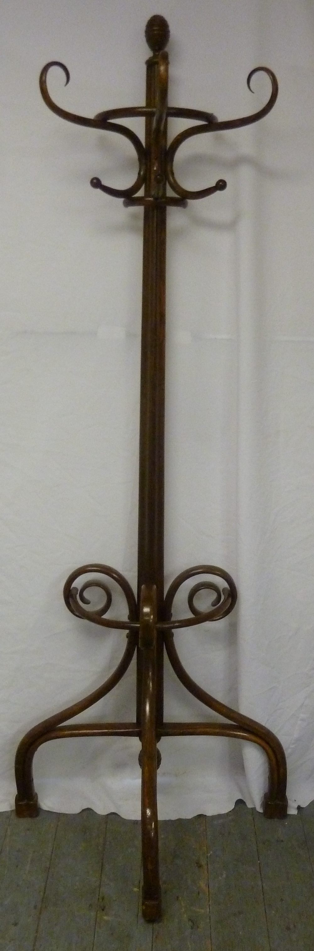 Bentwood coat stand of customary form