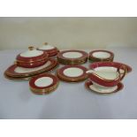 Wedgwood Ruby W32 dinner service to include plates, tureens, platters, gravy boat and stand