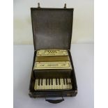 Hohner accordion in fitted case