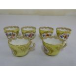 Meissen six cabinet cups, hand painted with flowers and gilding, marks to the base