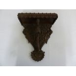 Black Forest wall bracket carved with a bird, leaves and branches A/F