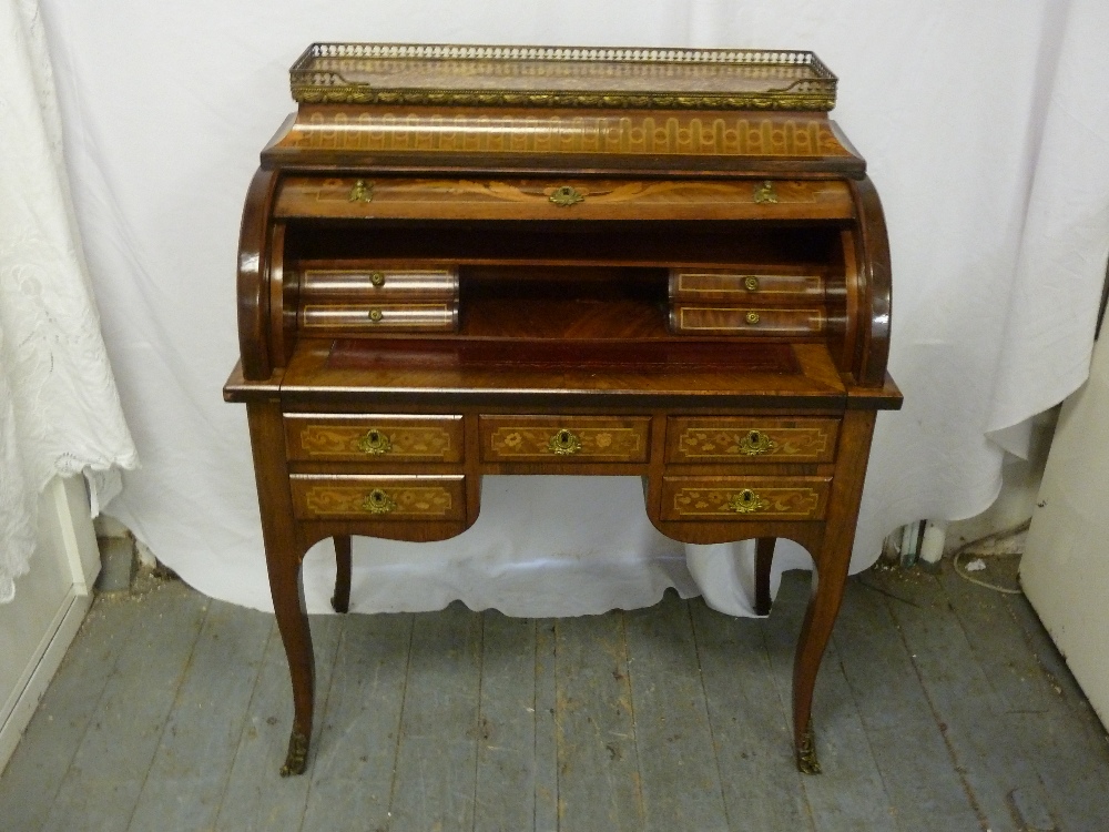 French style roll top desk with pierced metal gallery on four cabriole legs