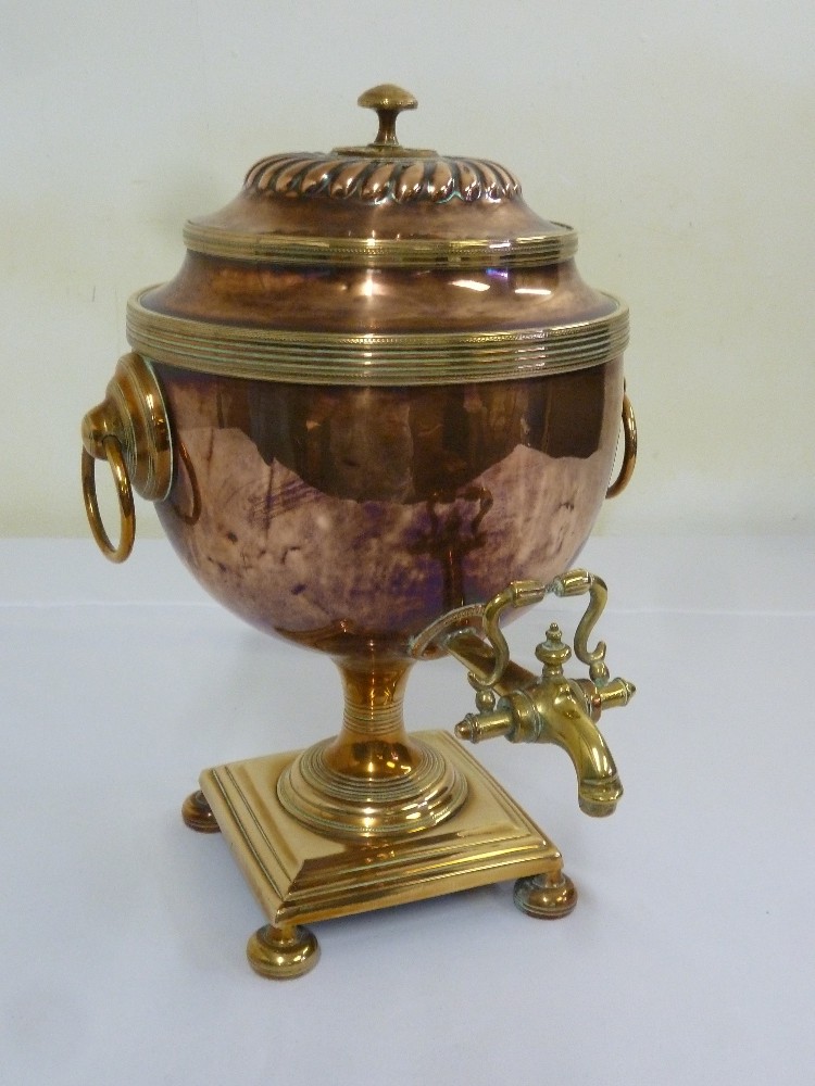 An early 20th century brass and copper samovar