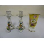 A pair of Dresden porcelain hand painted candlesticks and a Rosenthal vase, marks to the bases