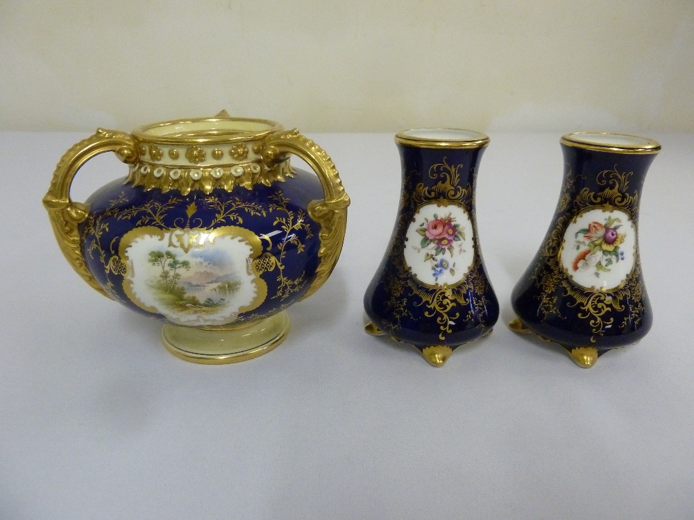 Coalport Borrowdale three handled vase and a pair of matching vases