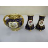Coalport Borrowdale three handled vase and a pair of matching vases