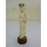 Japanese composition figurine of a Geisha on hardwood stand