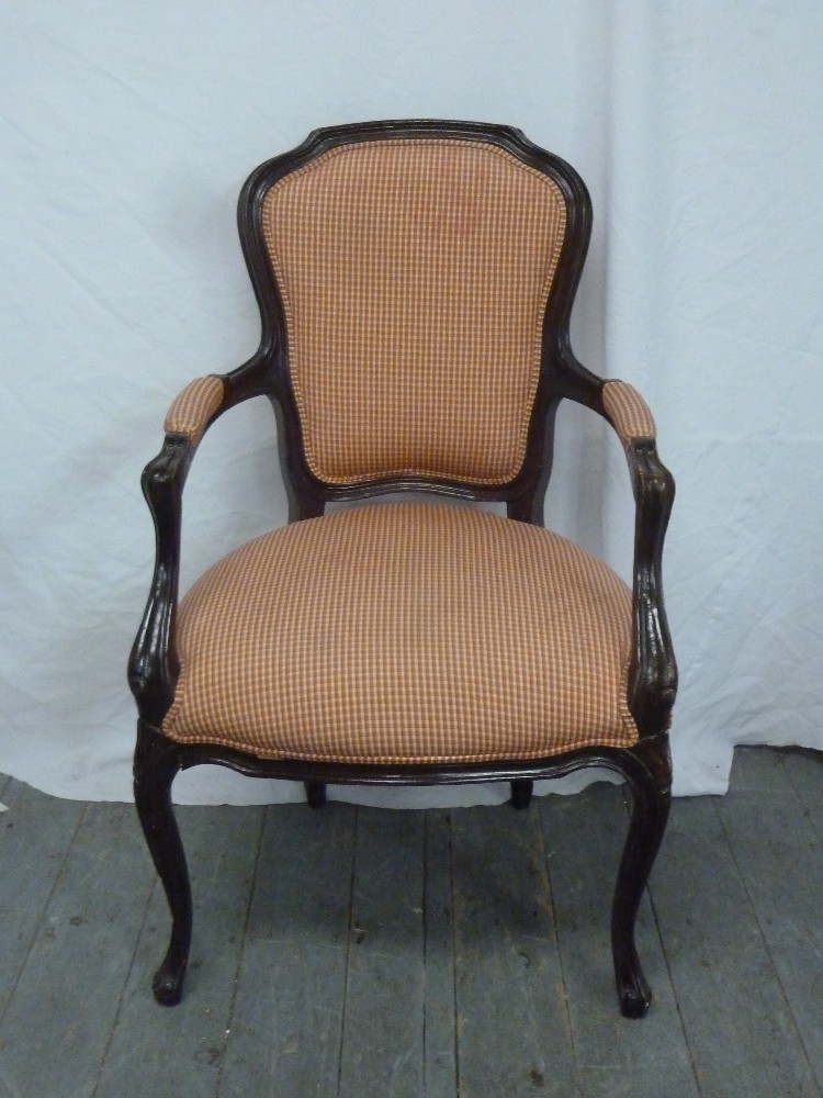 Mahogany upholstered armchair on cabriole legs