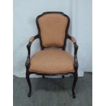 Mahogany upholstered armchair on cabriole legs