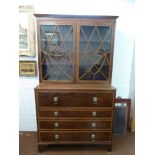 Mahogany bureau breakfront cabinet with glazed top section and four drawers with lion mask ring