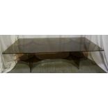 A 1970s perspex and glass coffee table