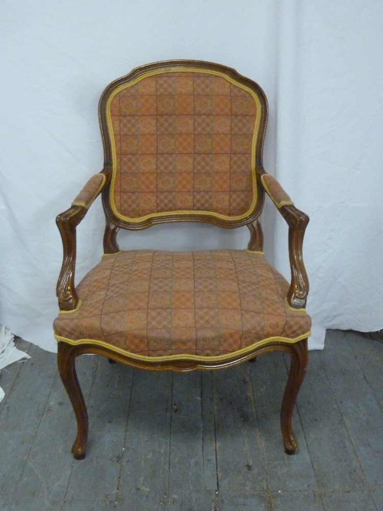 Mahogany upholstered armchair on cabriole legs