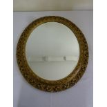 Oval gilt wood wall mirror