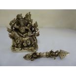 Tibetan white metal figurine of Buddha and a Tibetan white metal Phurba