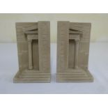 A pair of composition book ends in the form of a classical temple by Timothy Richards